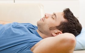 Comfortable dental sedation man in San Jose sleeping
