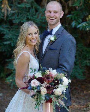 Smiling newly wed couple with white teeth from teeth whitening in San Jose