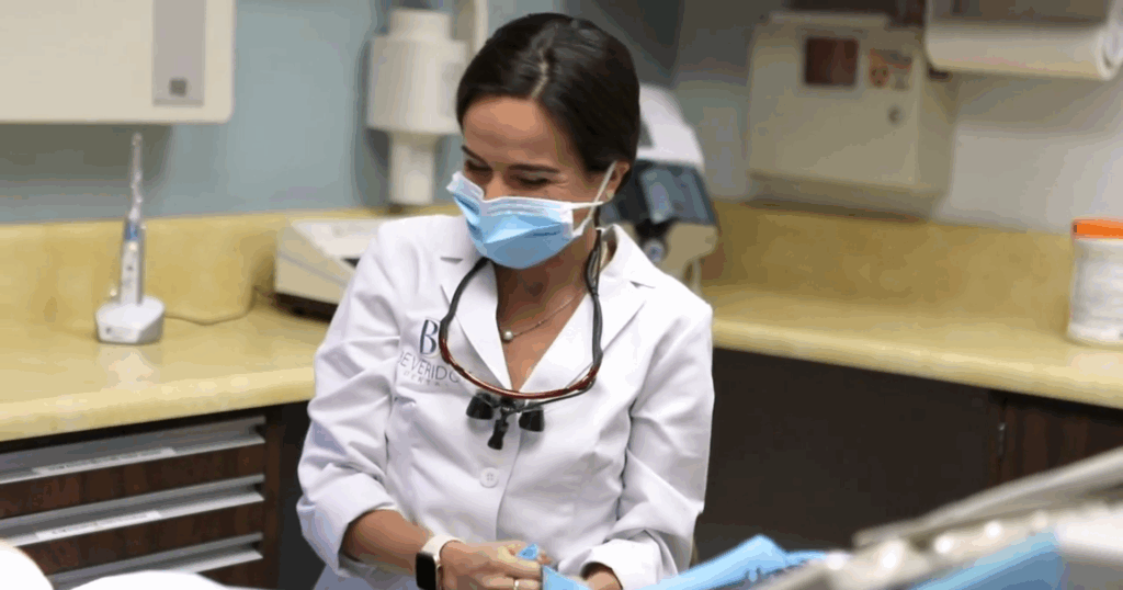 Dr Erin Beveridge Cabuling helping a patient at San Jose dental office