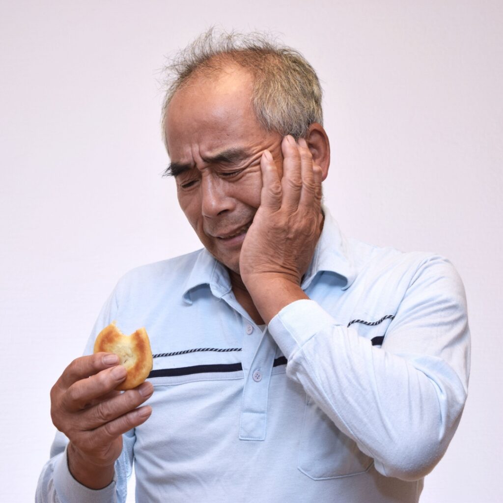 man with toothache before visiting emergency dentist in San Jose