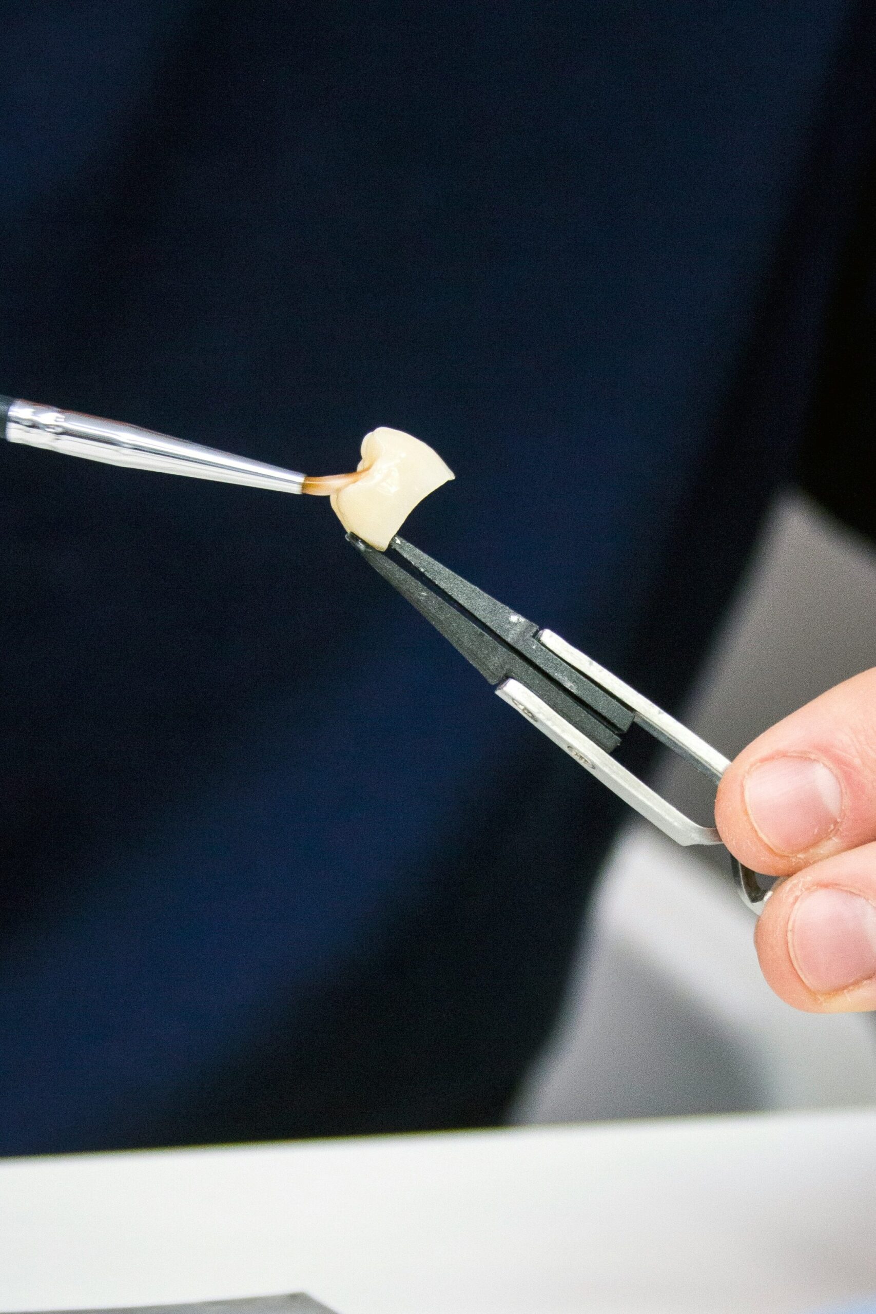 San Jose dentist shaping a dental crown